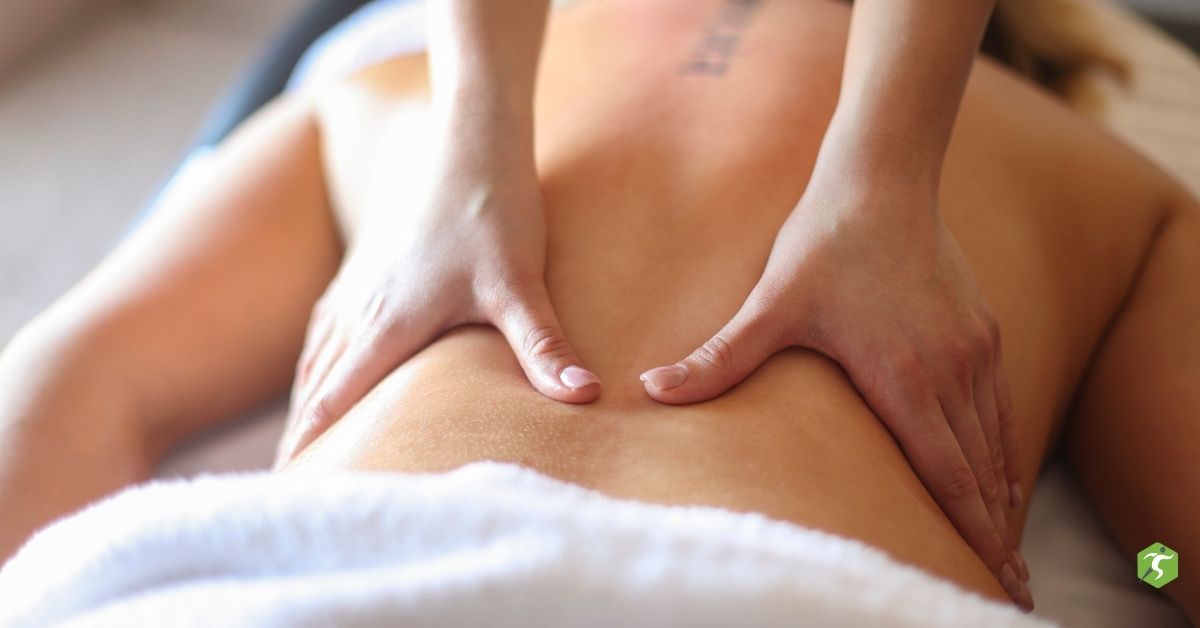 Student massage therapist providing a 70-minute relaxation massage at Therapy Now clinic in Surrey.